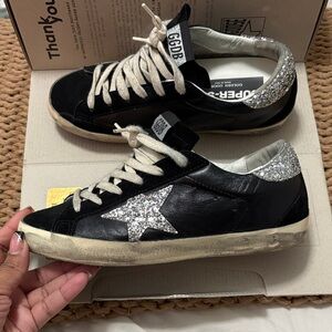 Golden Goose Black and Silver Star Sneakers